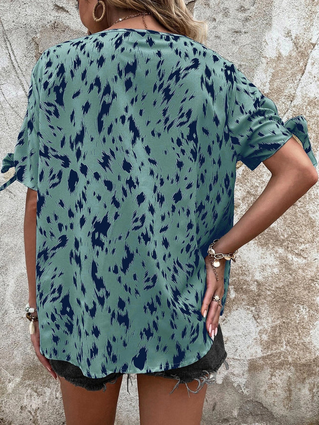Tied Printed Boat Neck Blouse.