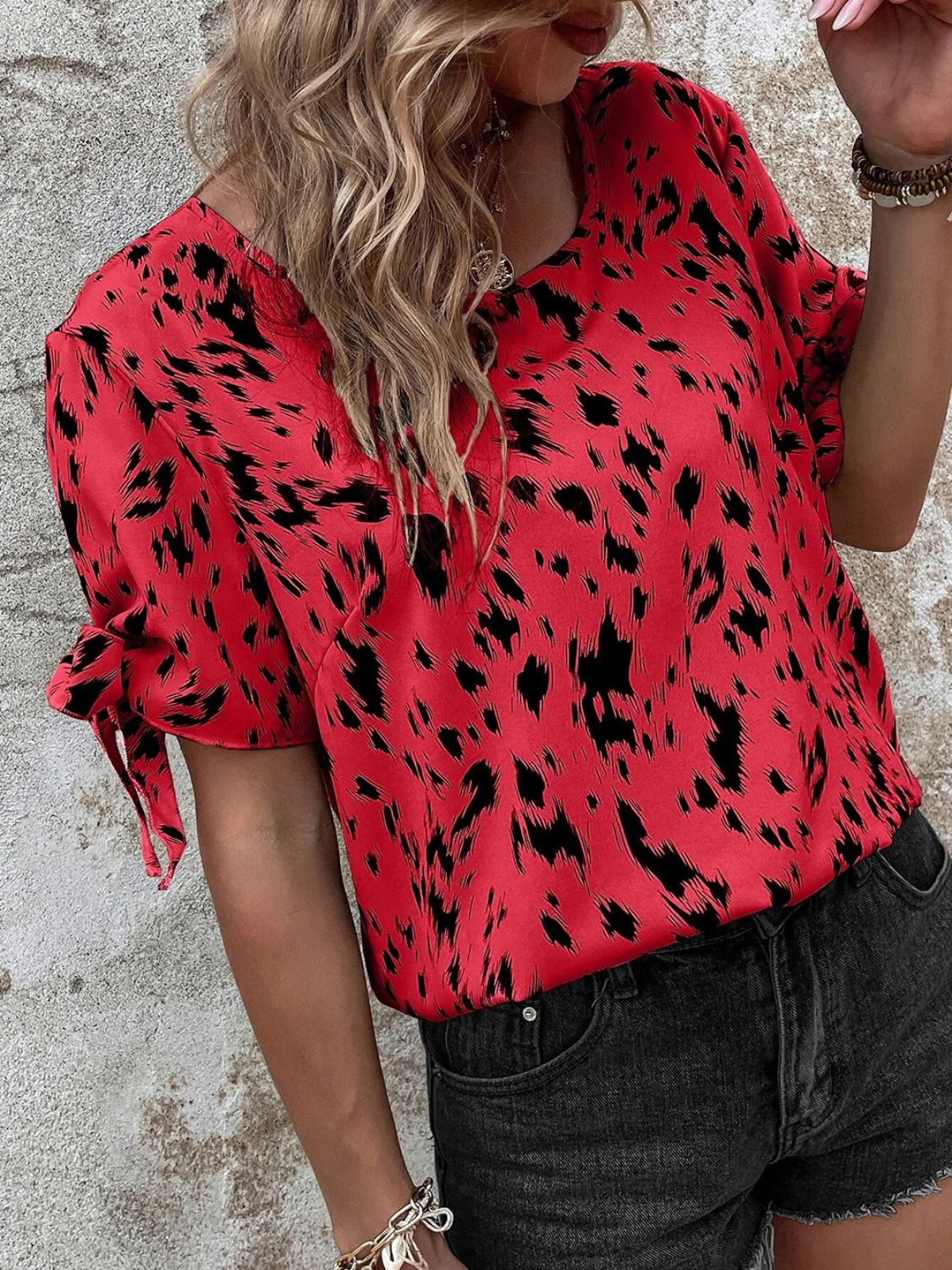 Tied Printed Boat Neck Blouse.