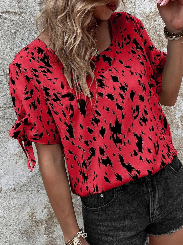 Tied Printed Boat Neck Blouse.
