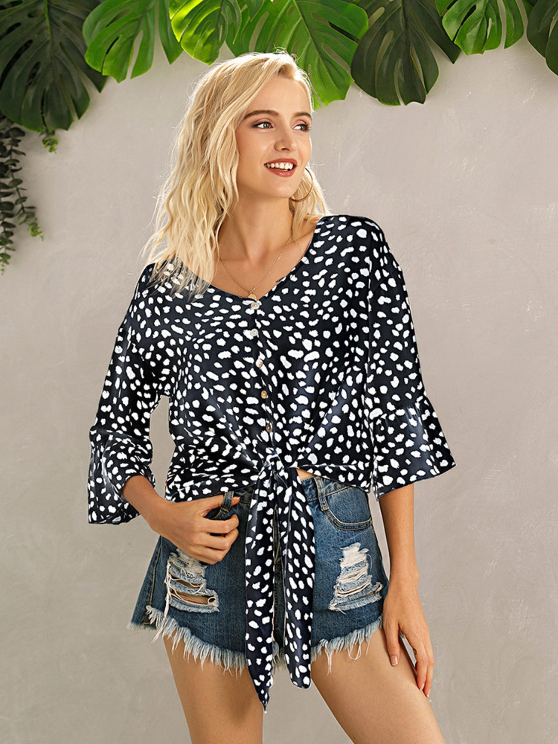 Ivy Lane Tied Printed Button Up V-Neck Blouse.