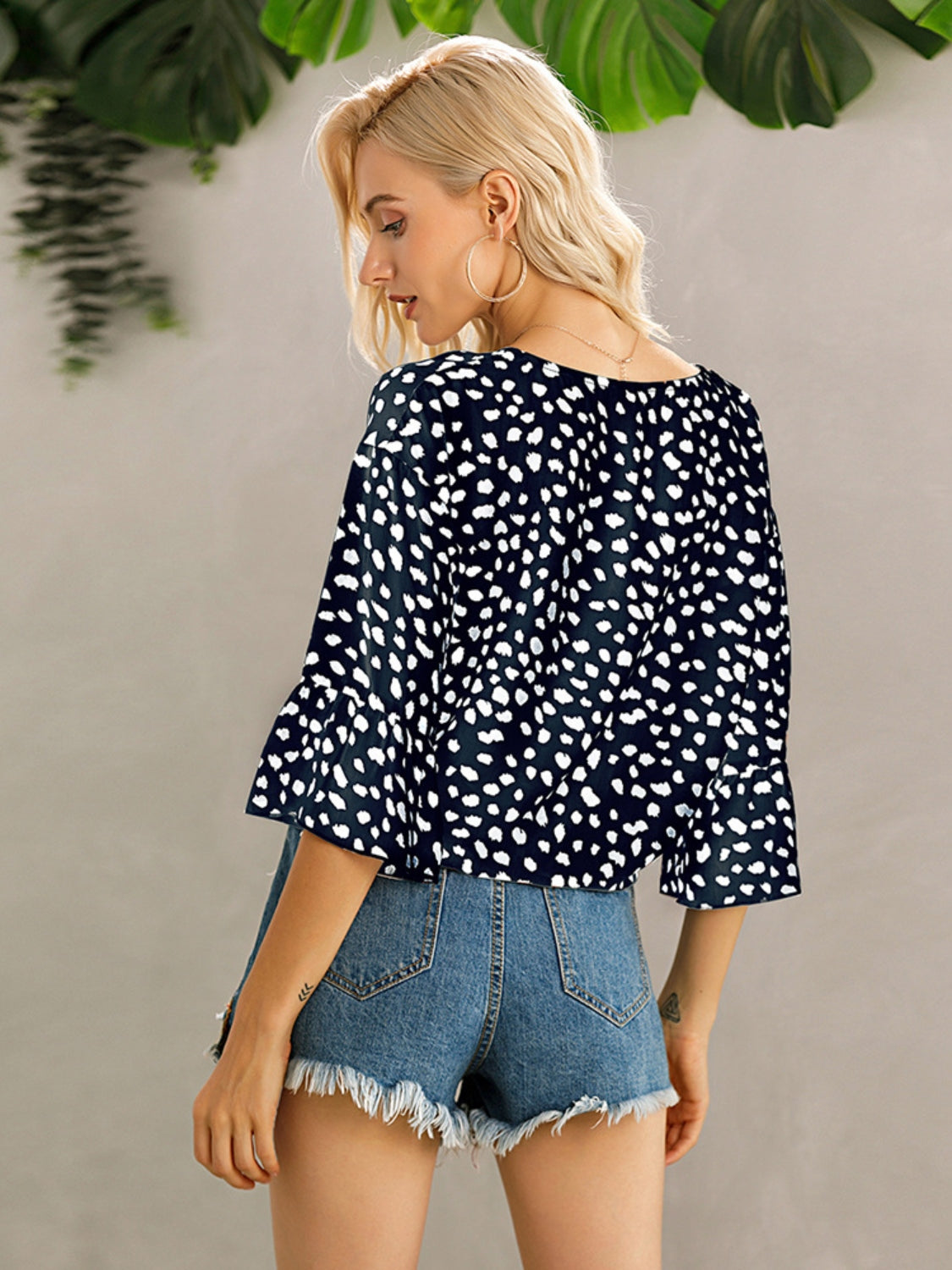 Ivy Lane Tied Printed Button Up V-Neck Blouse.