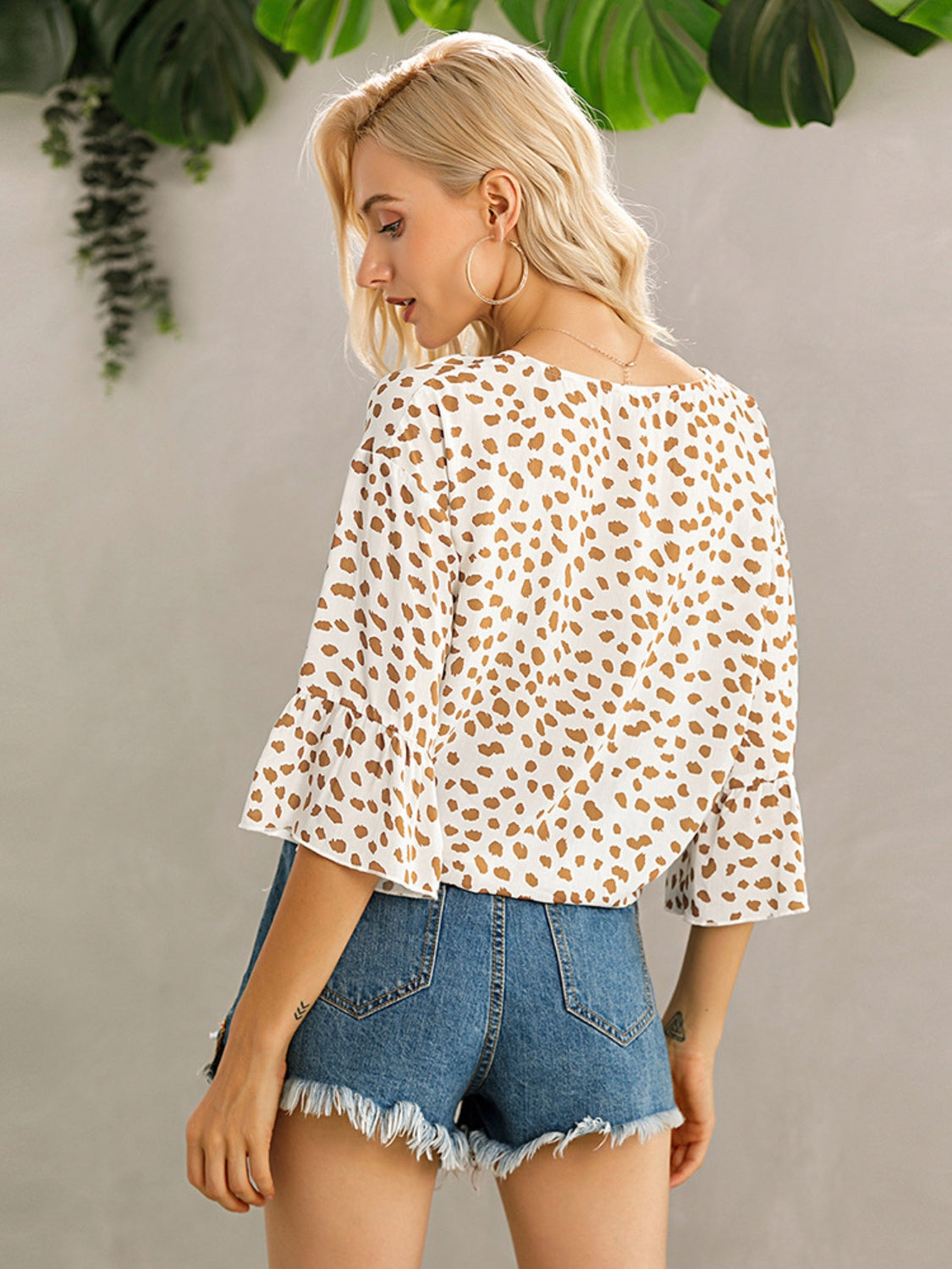Ivy Lane Tied Printed Button Up V-Neck Blouse.