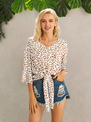 Ivy Lane Tied Printed Button Up V-Neck Blouse.