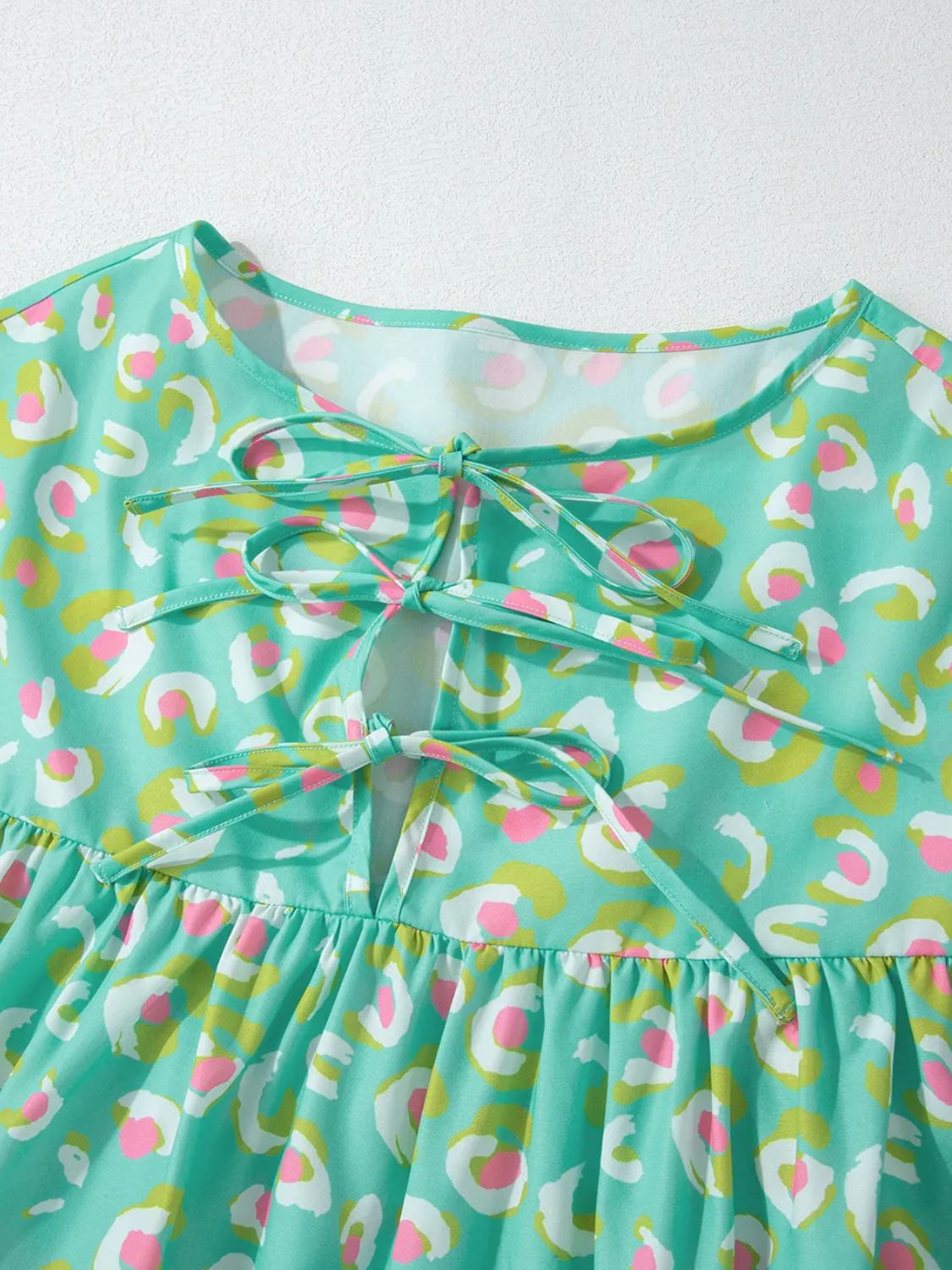 Tied Printed Long Sleeve Blouse.
