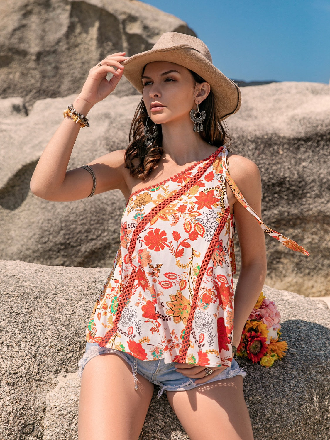 Tied printed one-shoulder tank, opaque.