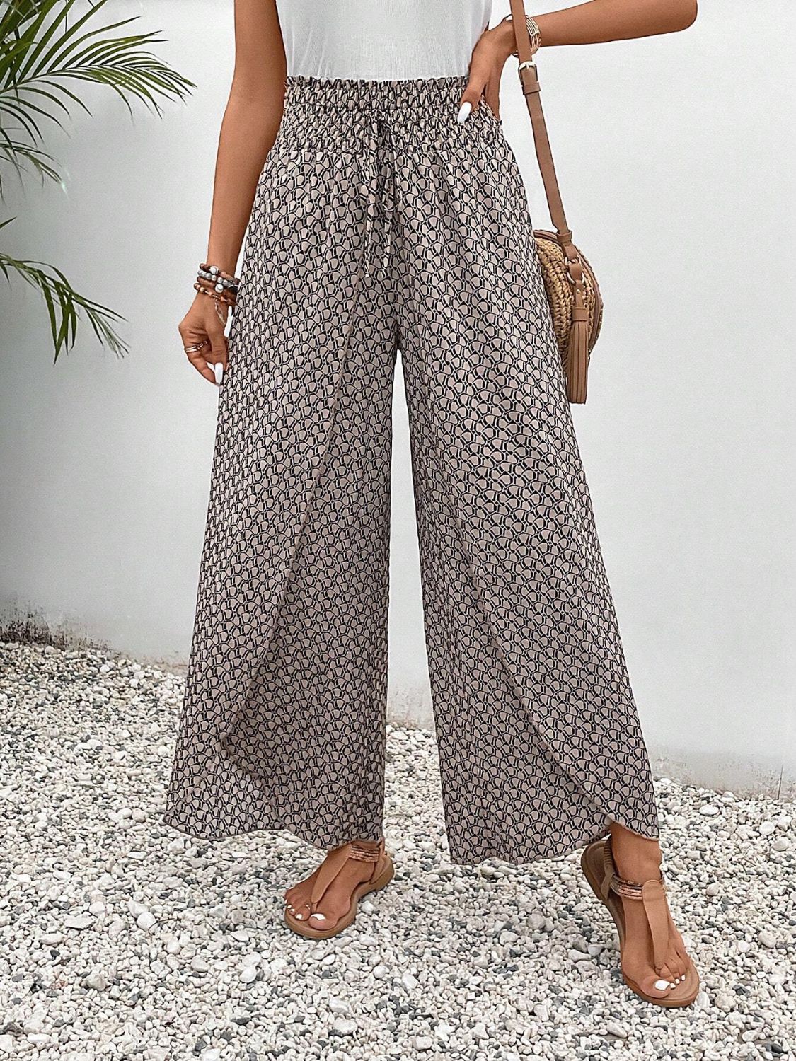 Tied printed wide leg pants with slit, opaque.