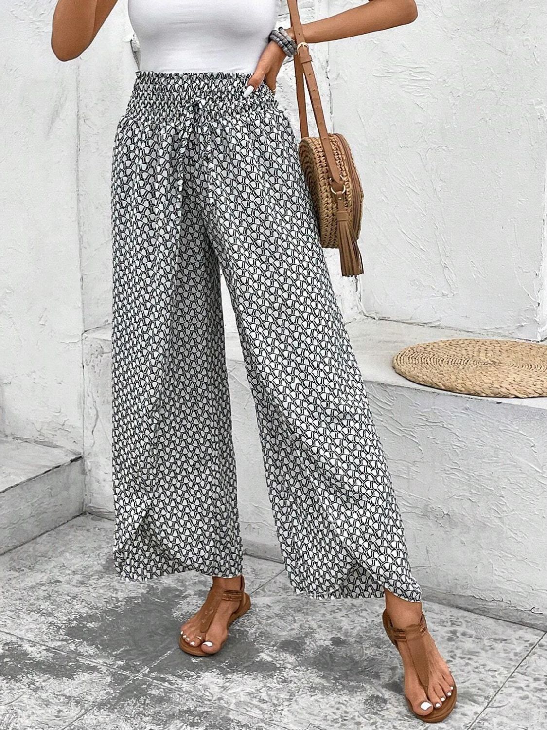 Tied printed wide leg pants with slit, opaque.