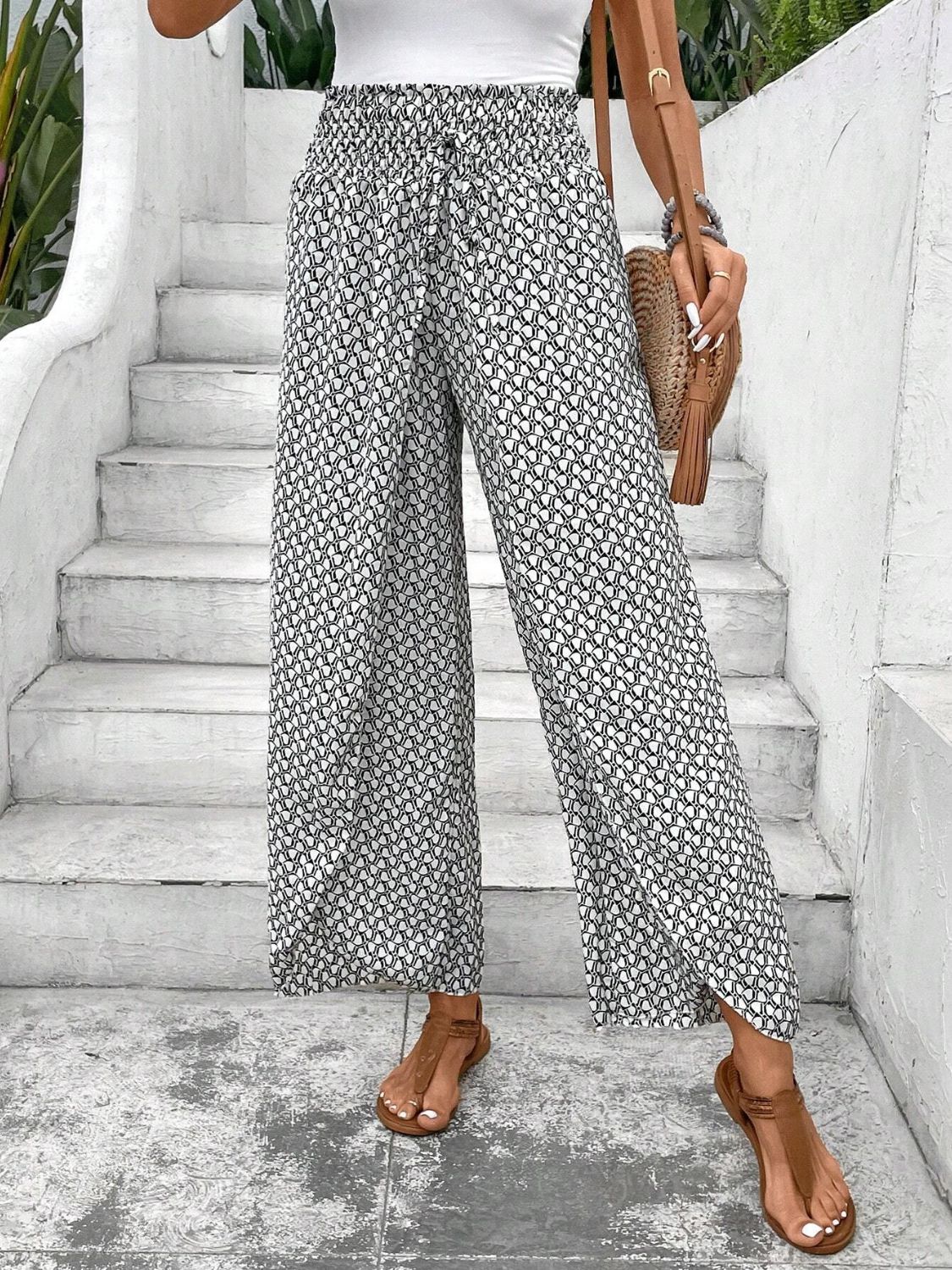 Tied printed wide leg pants with slit, opaque.