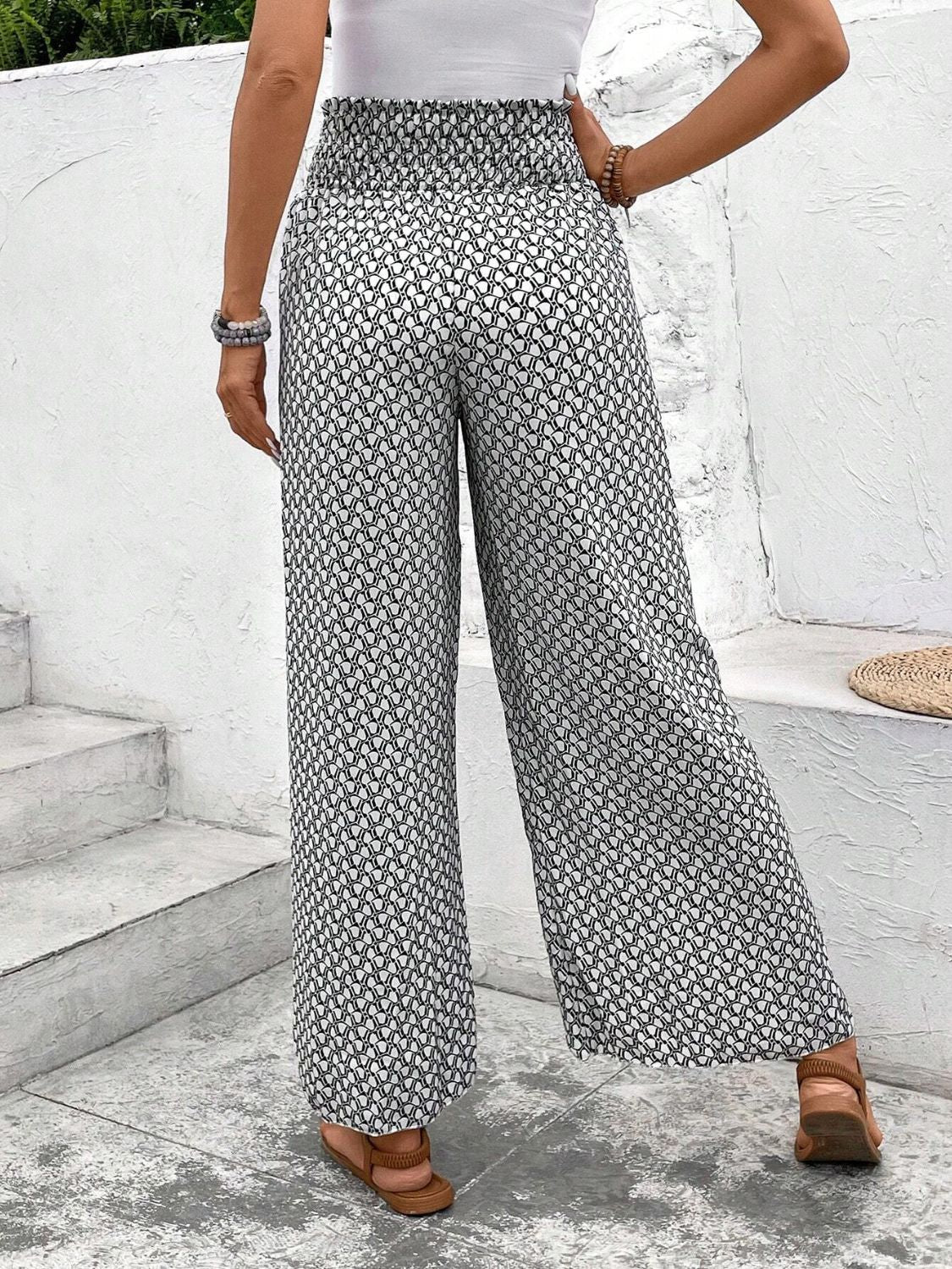 Tied printed wide leg pants with slit, opaque.