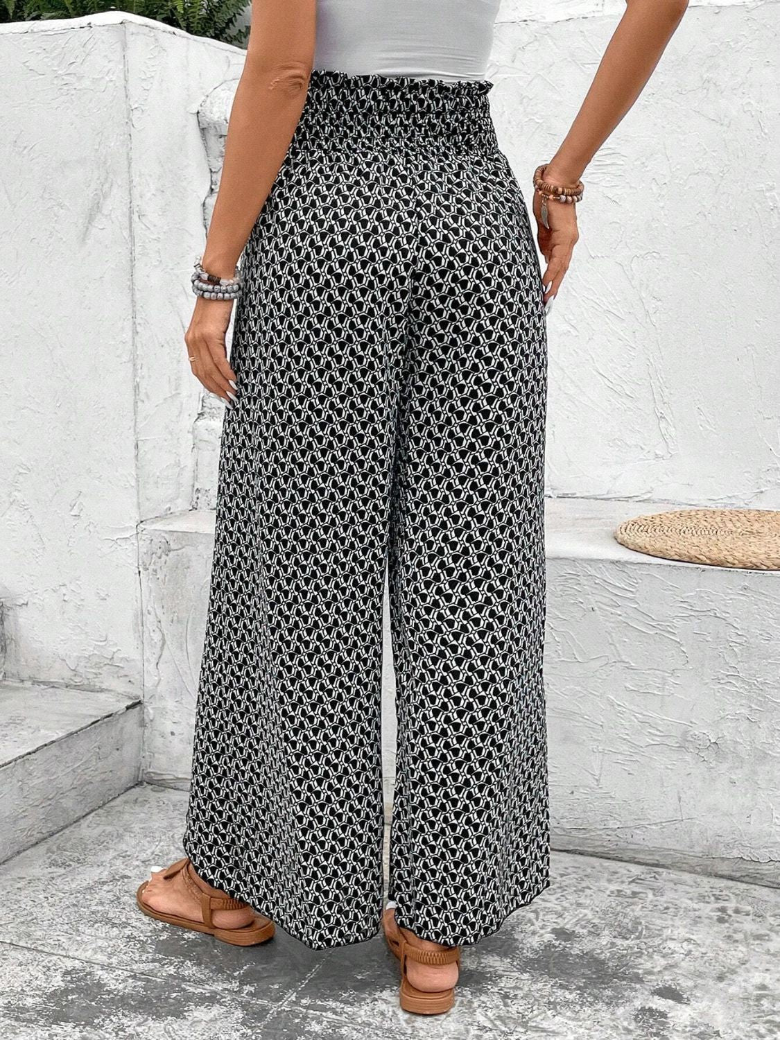 Tied printed wide leg pants with slit, opaque.