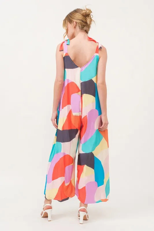 Tied Shoulder Straps Wide-Leg Geo Print Jumpsuit with Pockets.