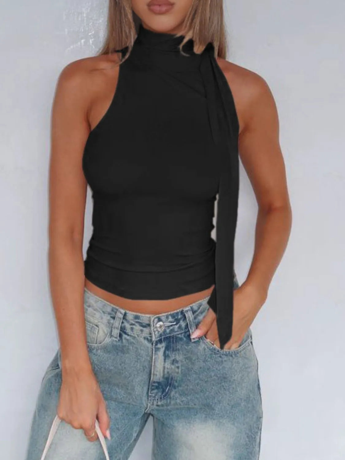 Tied solid color cami, slightly stretchy.