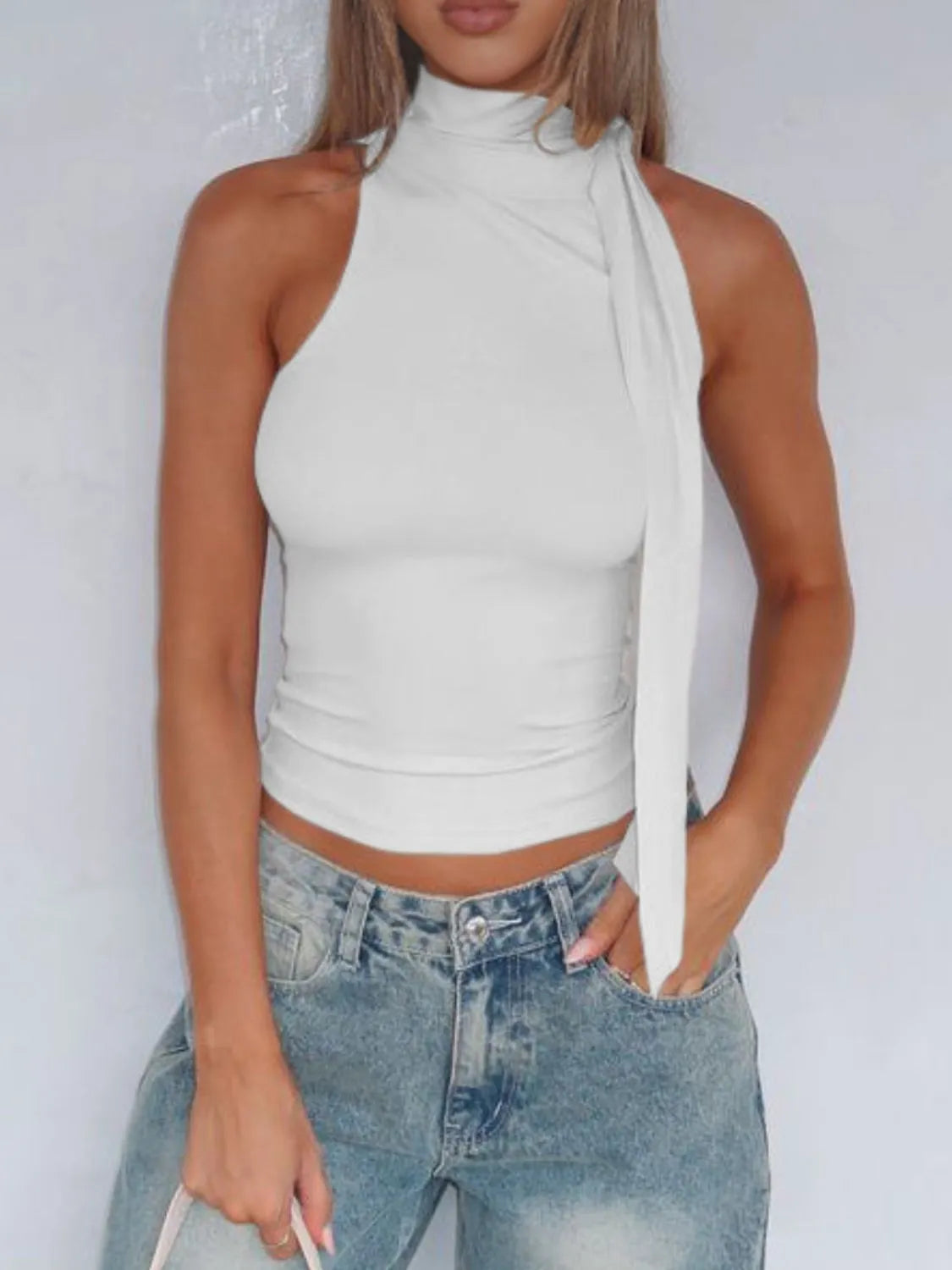 Tied solid color cami, slightly stretchy.