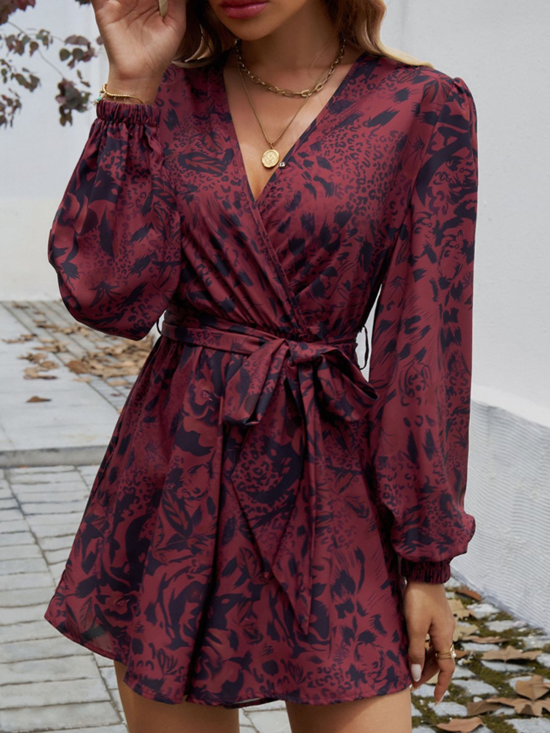 Tied Surplice Long Sleeve Romper.