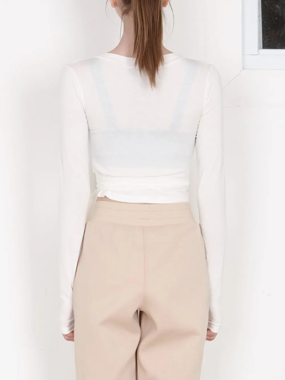 Tied Surplice Long Sleeve Top.