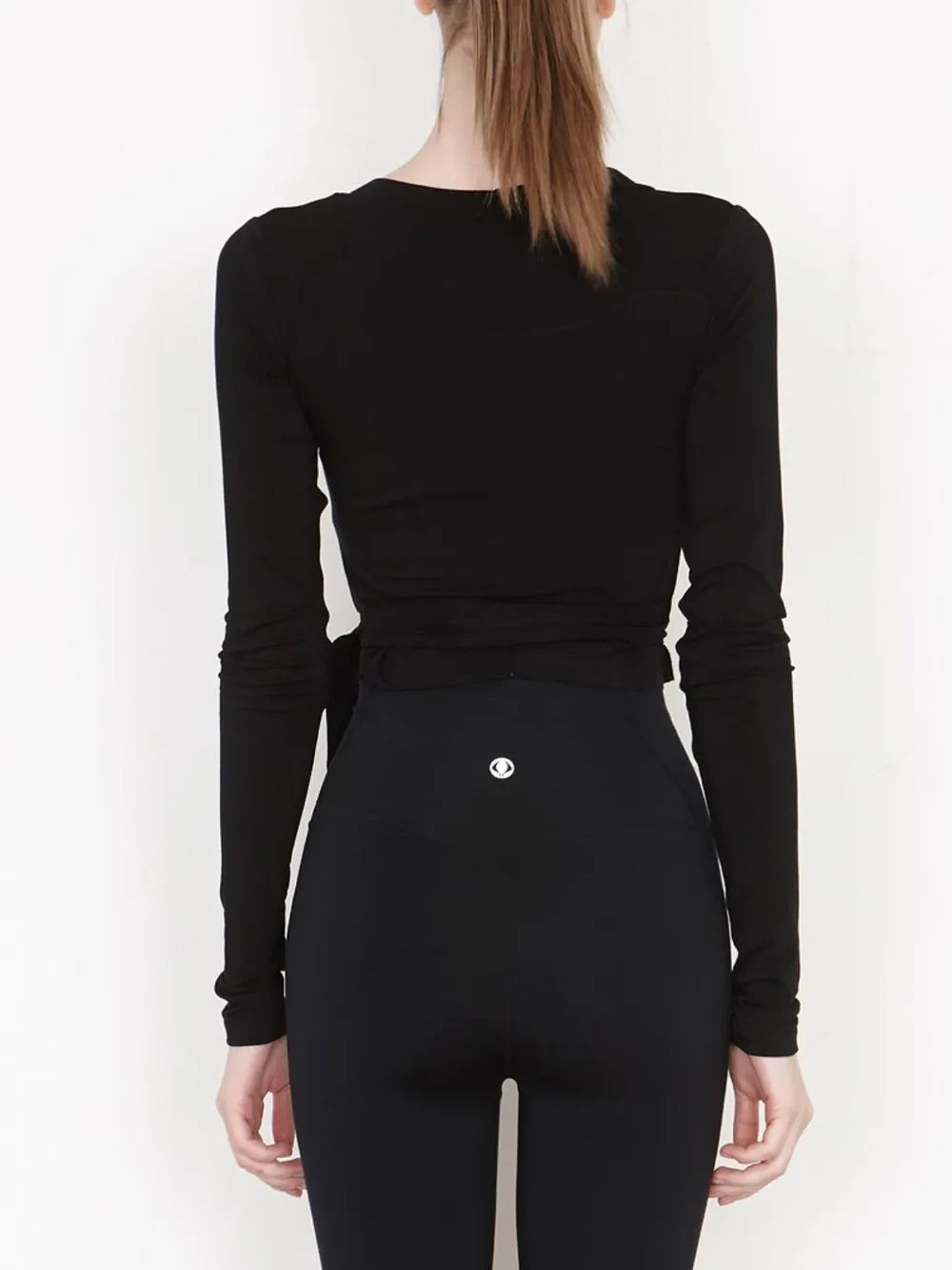 Tied Surplice Long Sleeve Top.