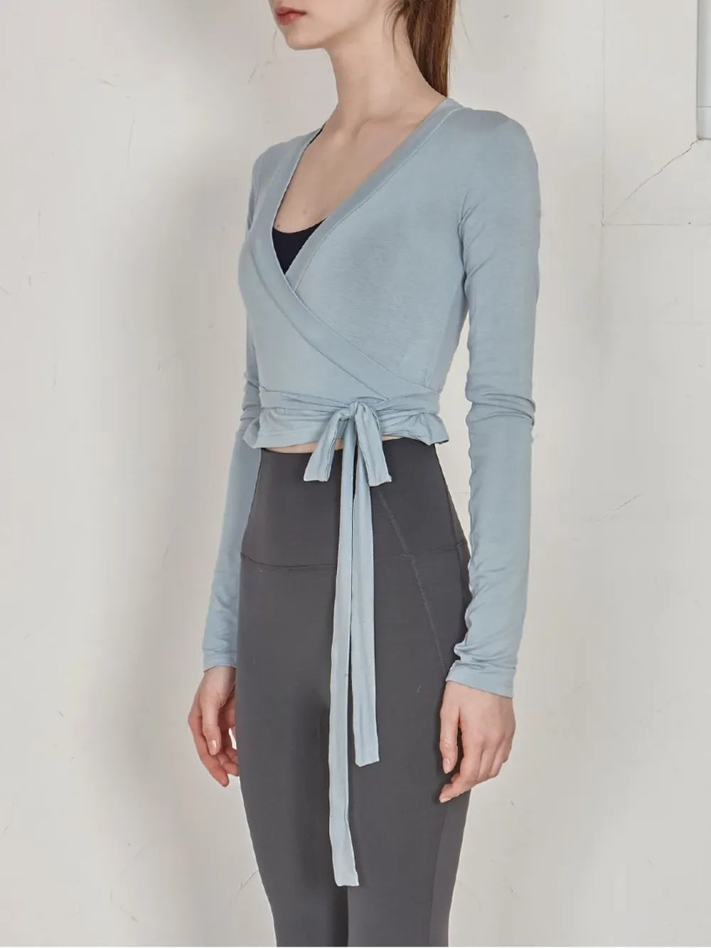 Tied Surplice Long Sleeve Top.