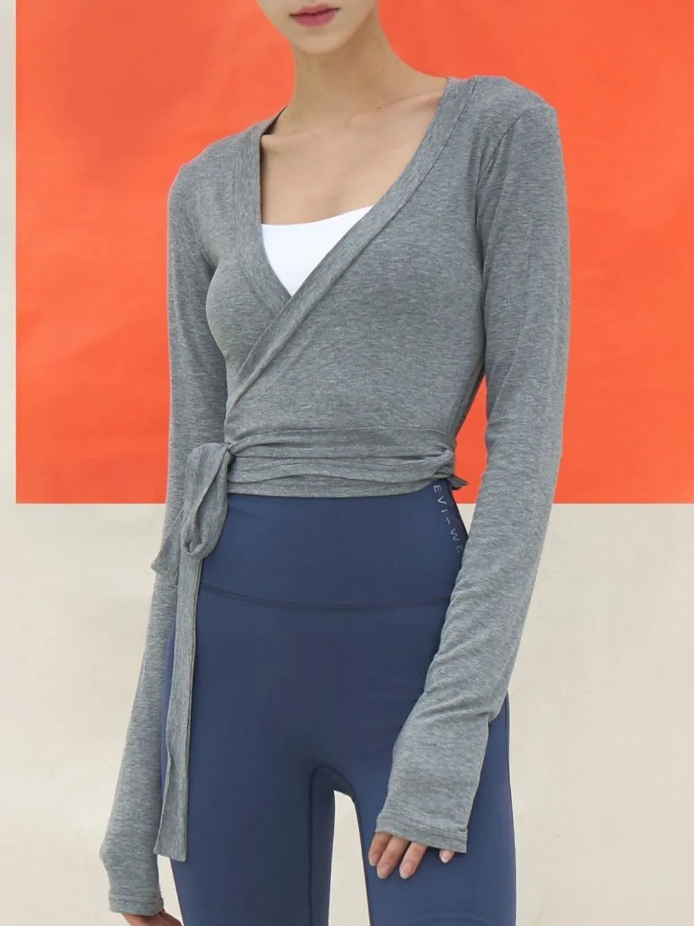 Tied Surplice Long Sleeve Top.