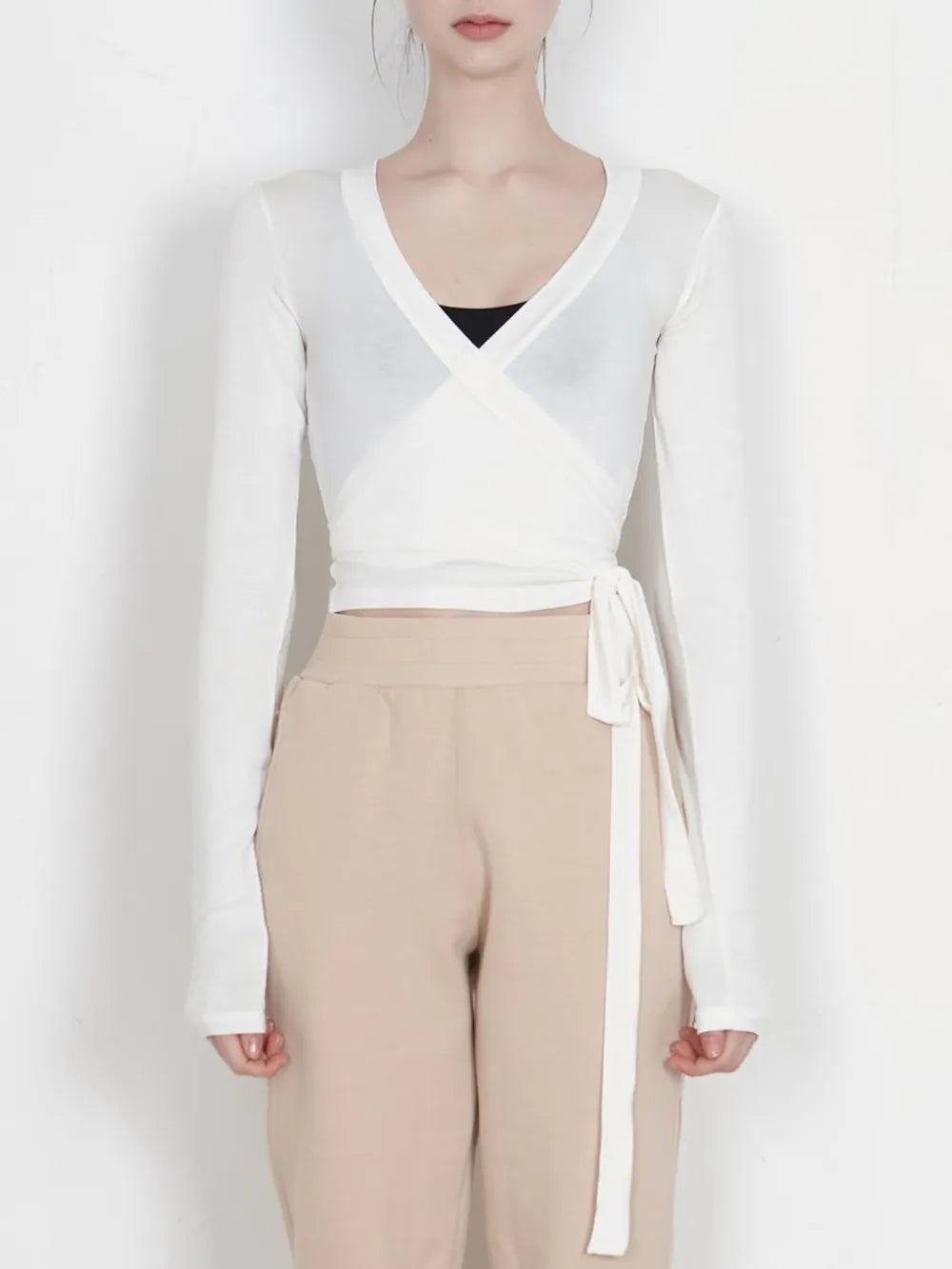 Tied Surplice Long Sleeve Top.