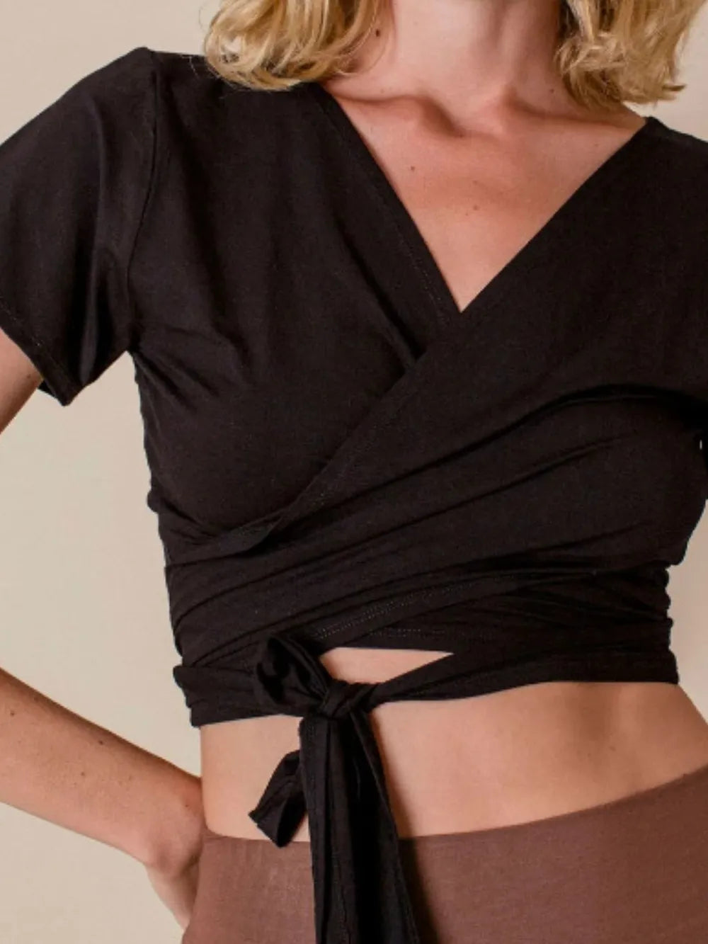 Tied Surplice Short Sleeve Top.