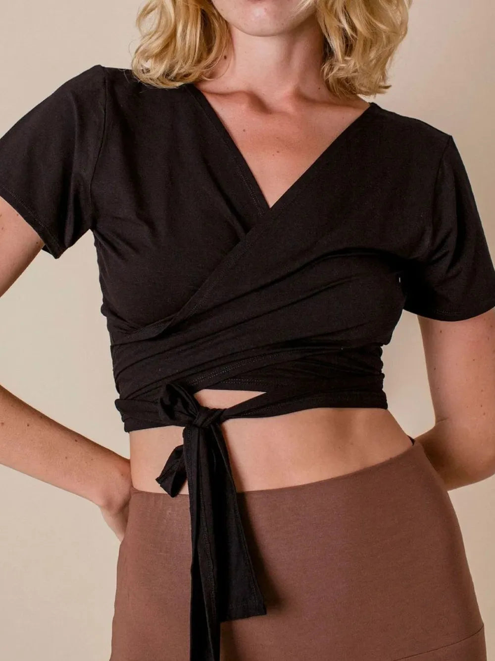 Tied Surplice Short Sleeve Top.