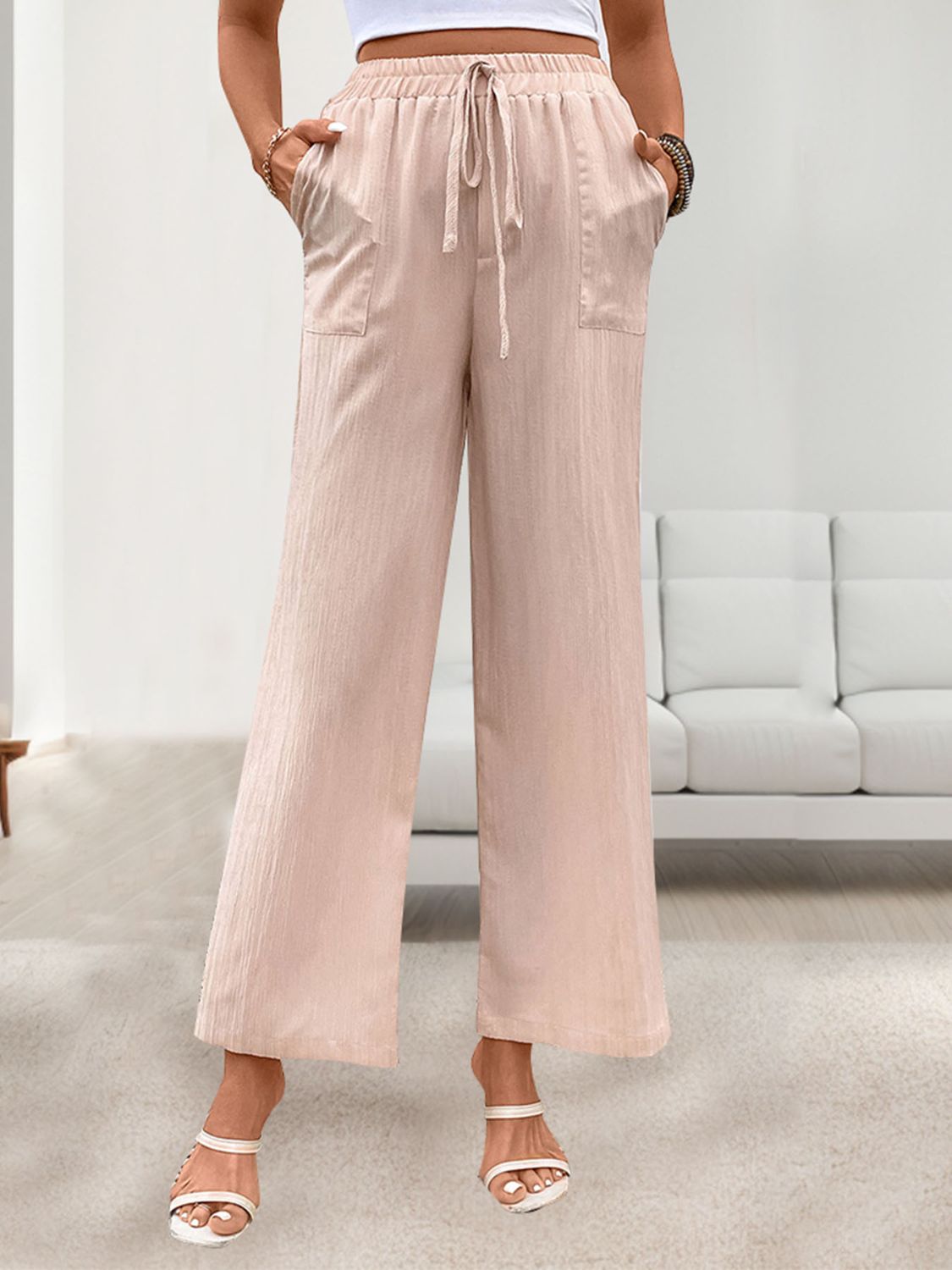 Tied wide leg pants with pockets, opaque.