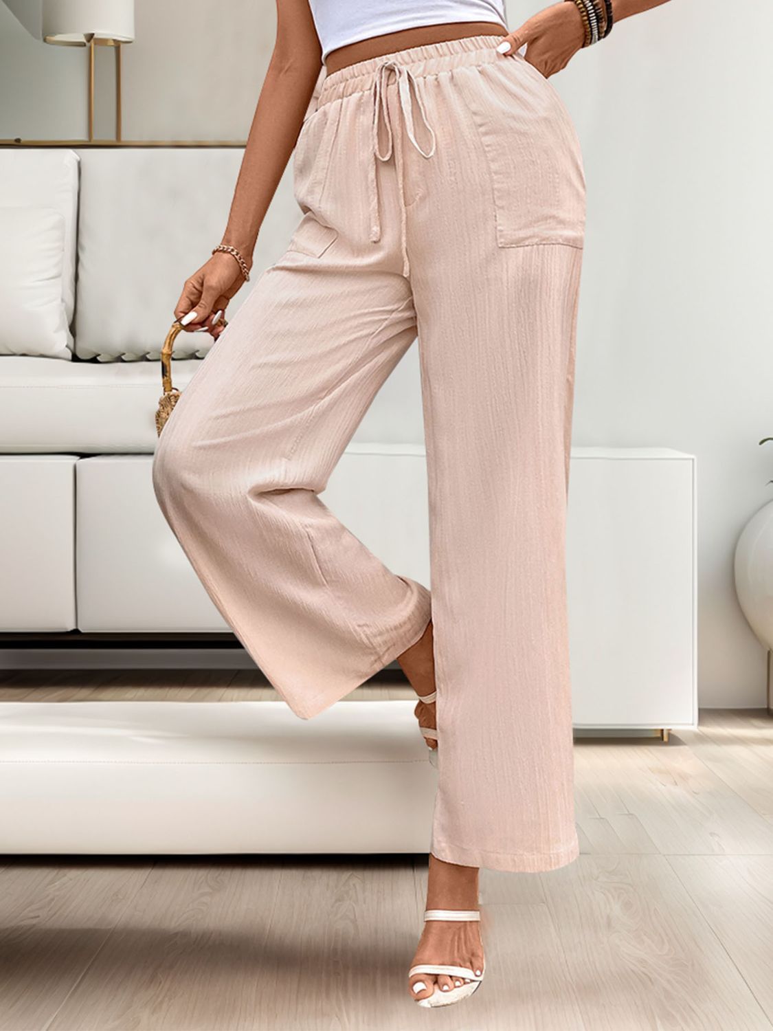 Tied wide leg pants with pockets, opaque.