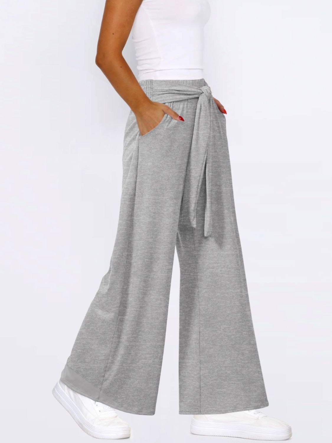 Tied wide leg pants with pockets, opaque.
