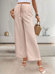 Tied wide leg pants with pockets, opaque.