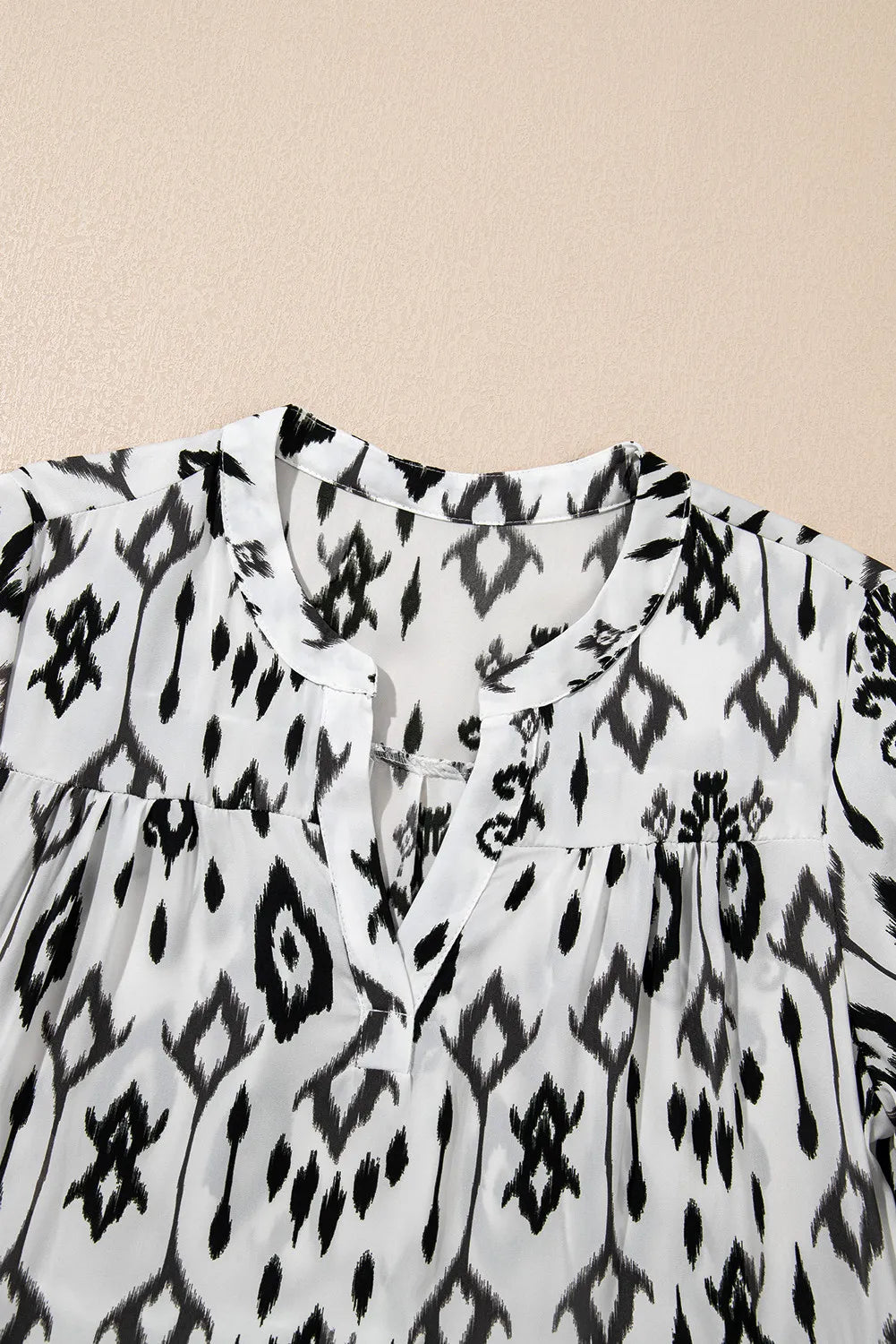 Tiered Printed Notched Long Sleeve Midi Dress.