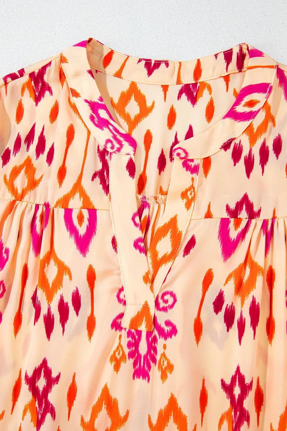 Tiered Printed Notched Long Sleeve Midi Dress.