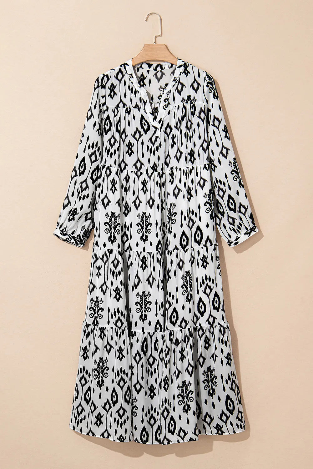Tiered Printed Notched Long Sleeve Midi Dress.