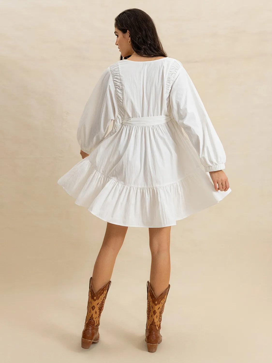 Tiered Tie Neck Long Sleeve Mini Dress.