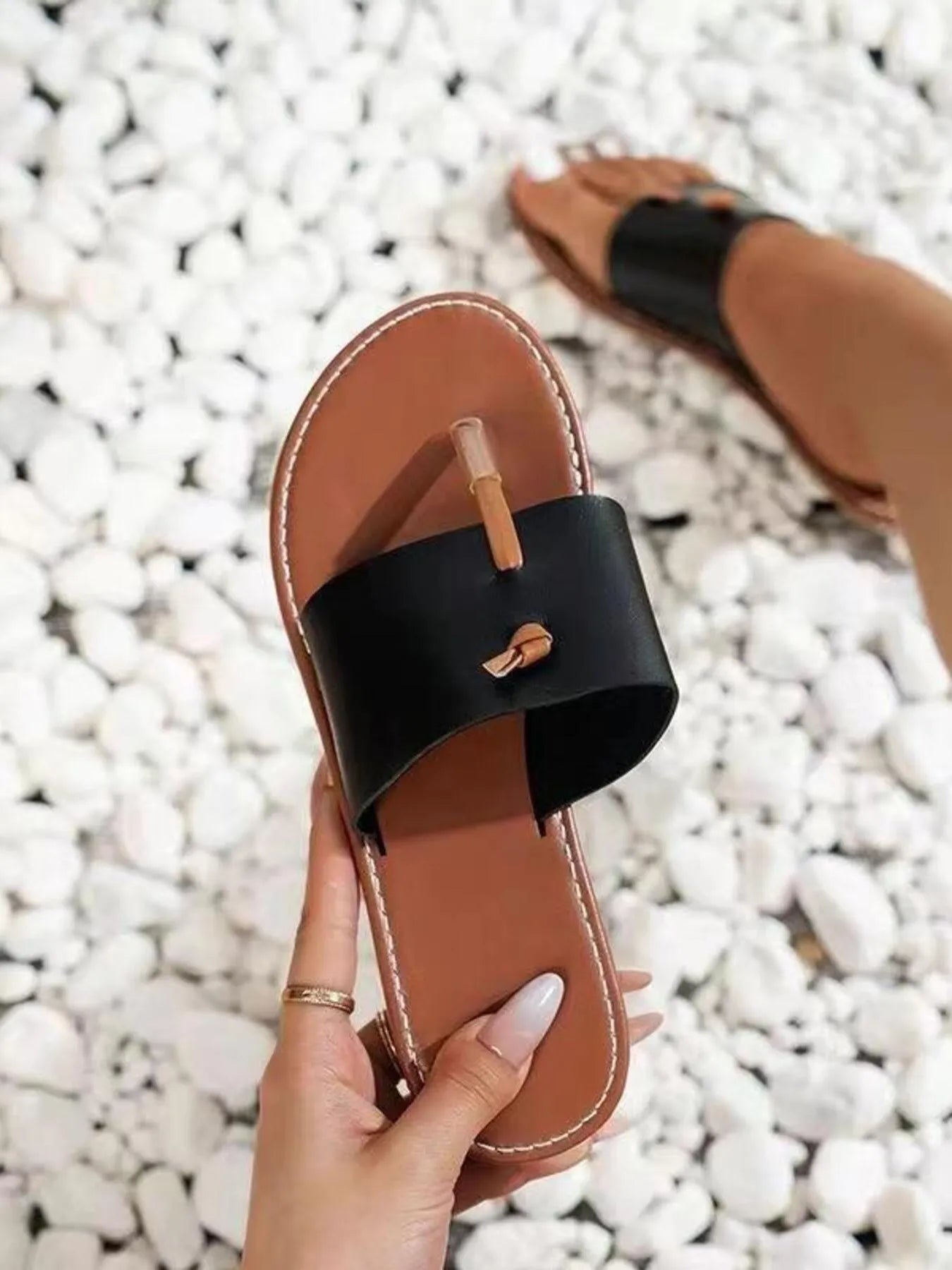 Toe post flat sandals.