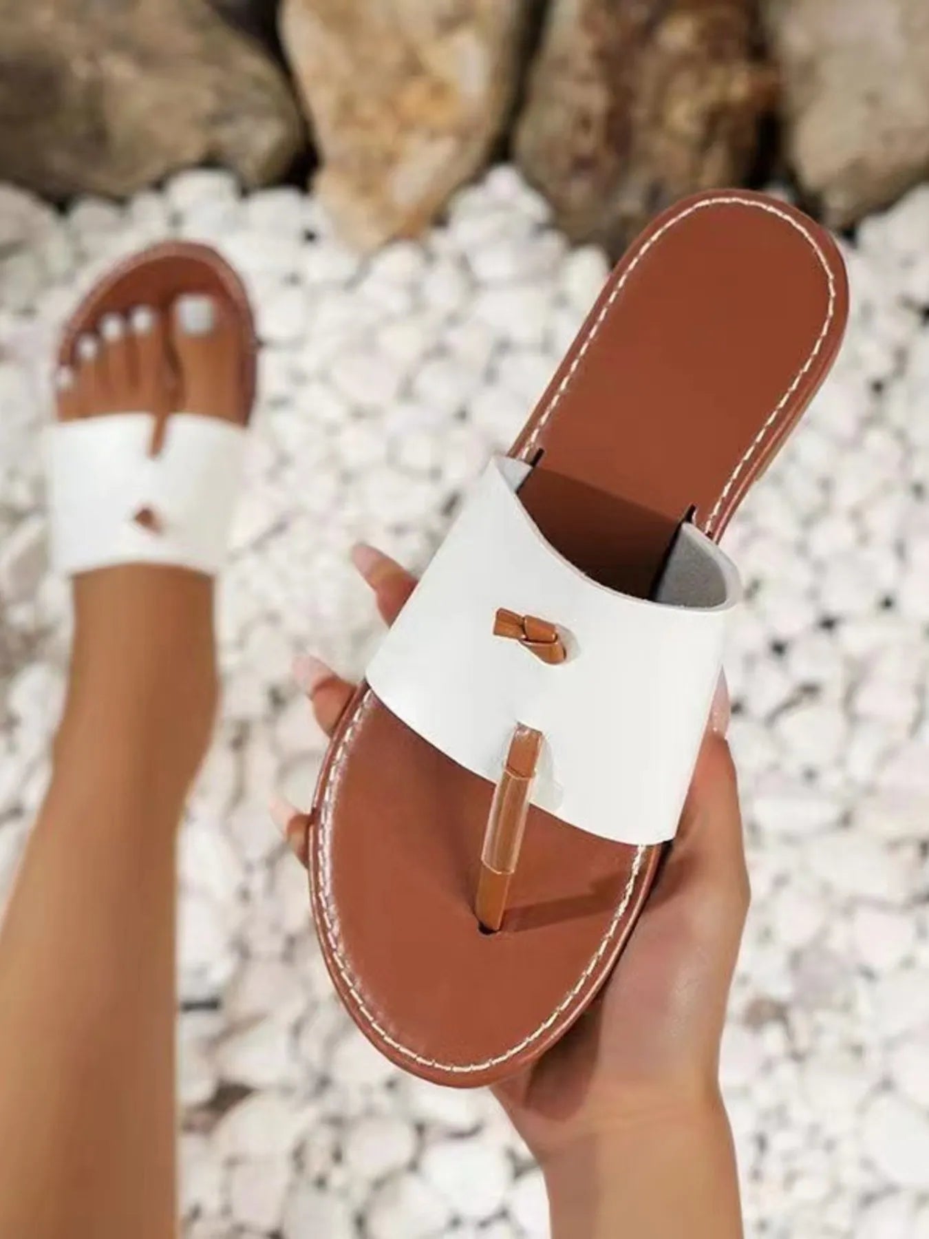 Toe post flat sandals.