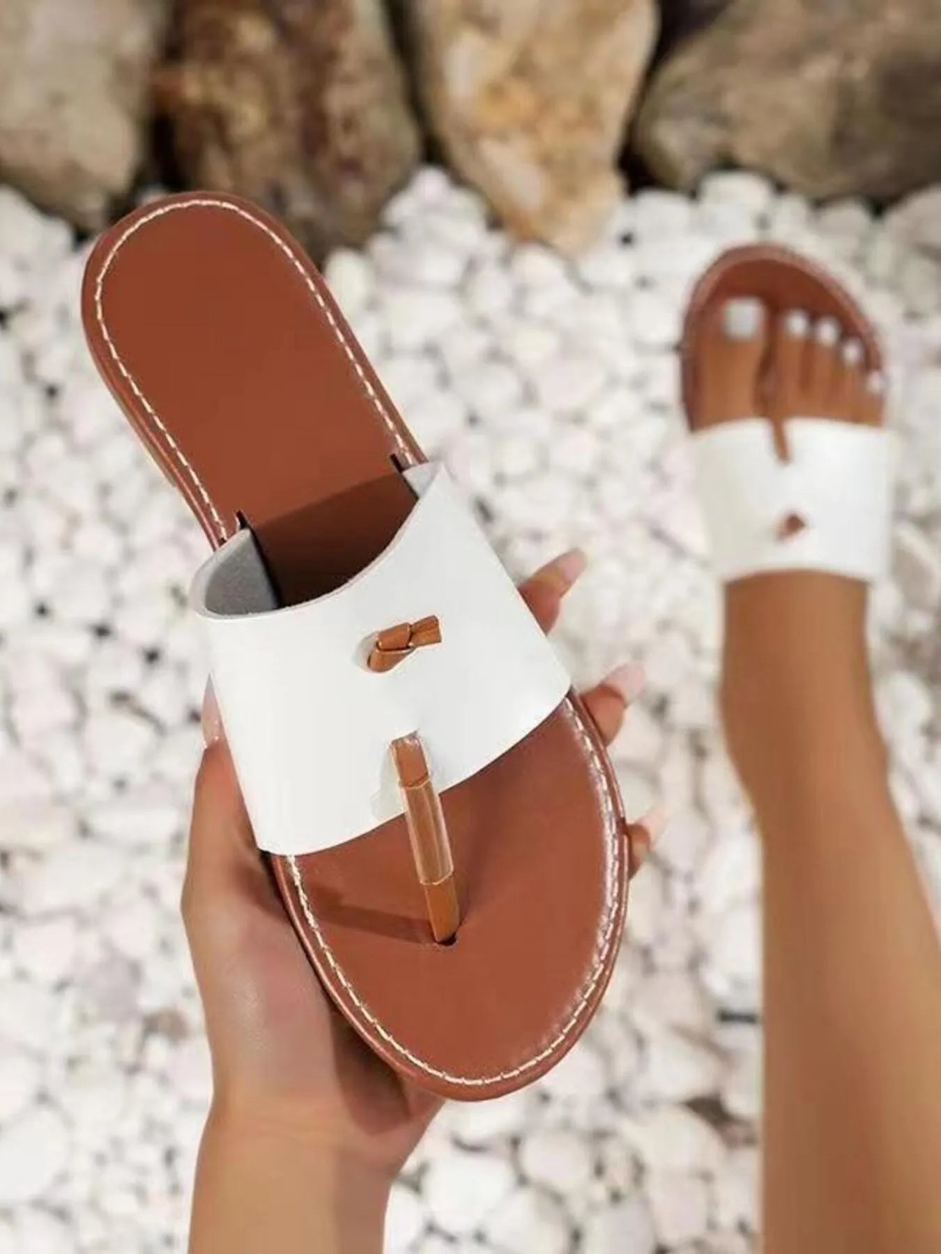 Toe post flat sandals.