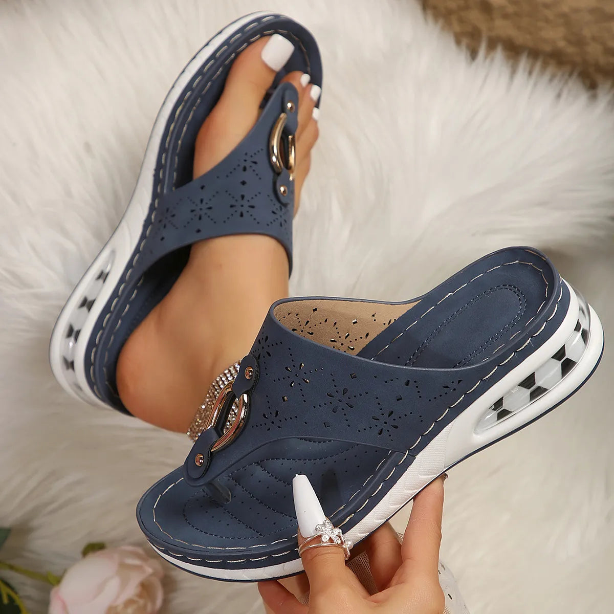 Toe post low heel wedge sandals.
