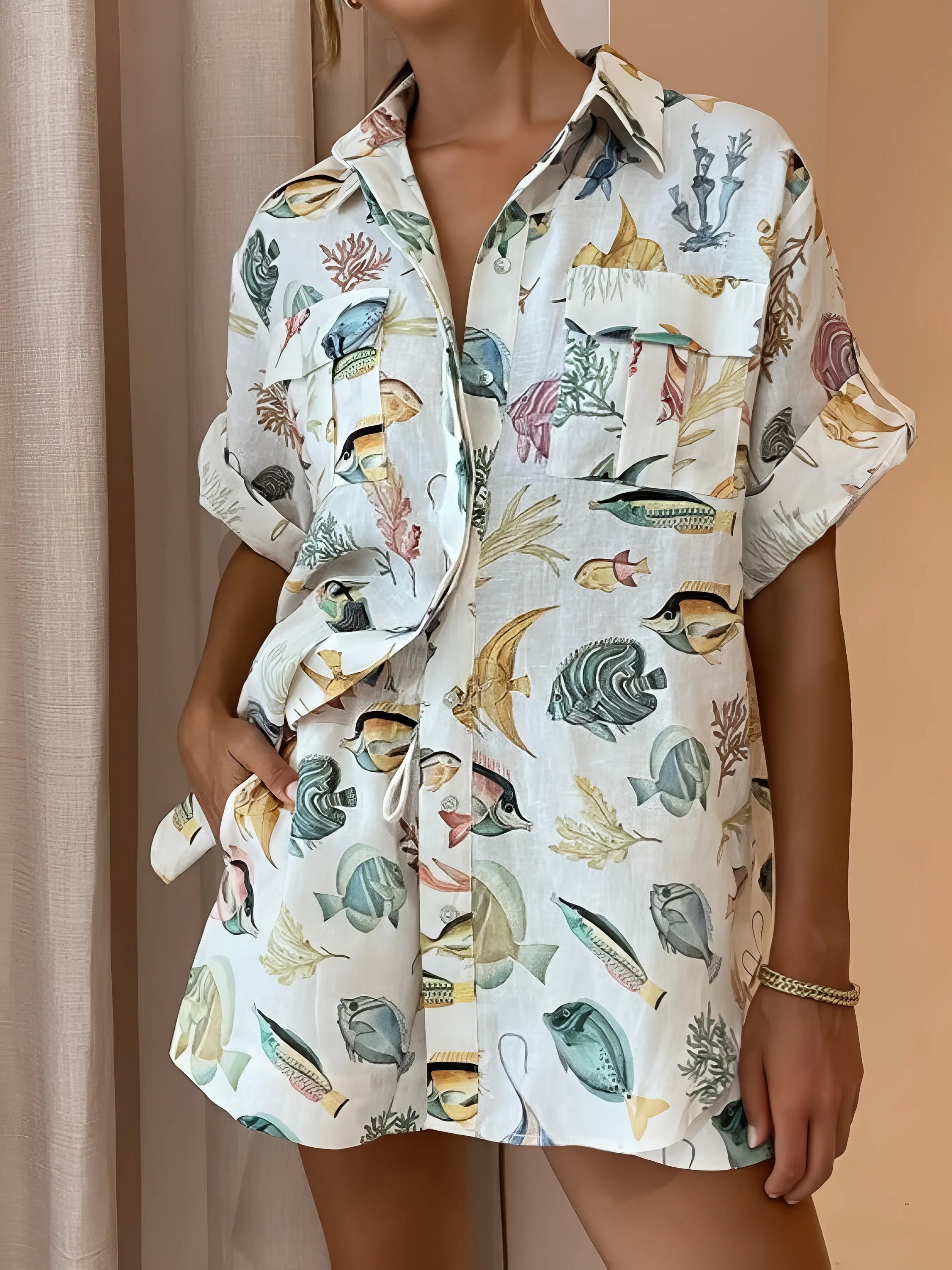 tropical print oversized button up shirt and shorts set, relaxed stylish women's outfit, vacation ready two-piece set, comfortable tropical print, oversized shirt, flowy shorts, ideal for summer getaways