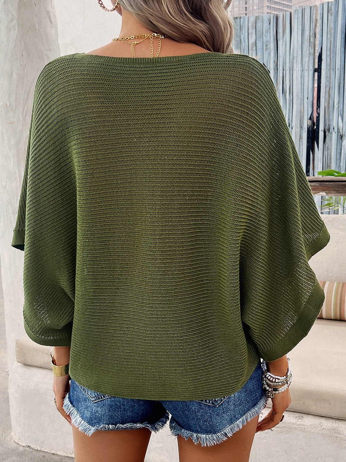 Devine V-Neck Batwing Sleeve Knit Top.