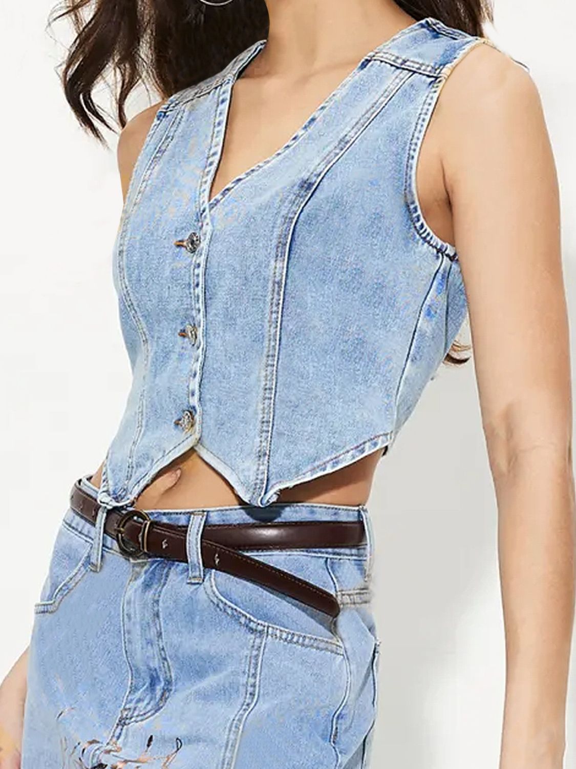 V-neck button up denim vest.