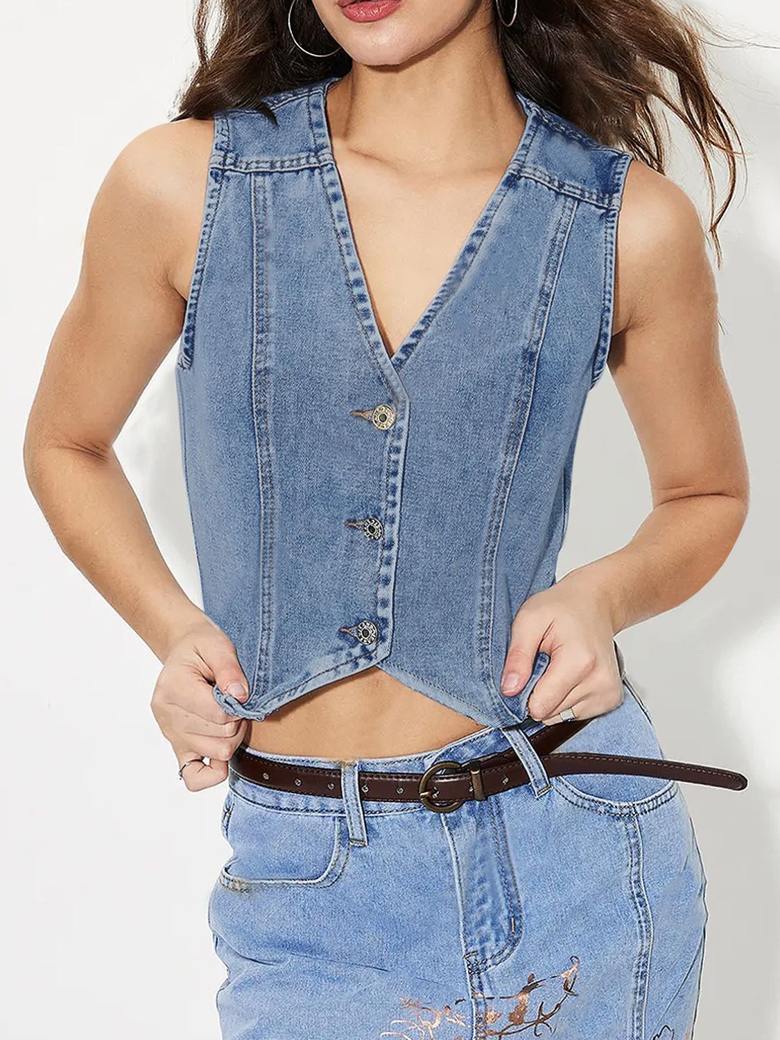 V-neck button up denim vest.