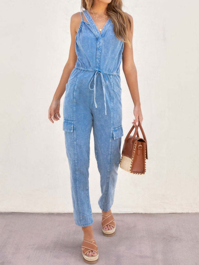 V-Neck Sleeveless Denim Jumpsuit with Pockets and Drawstring.
