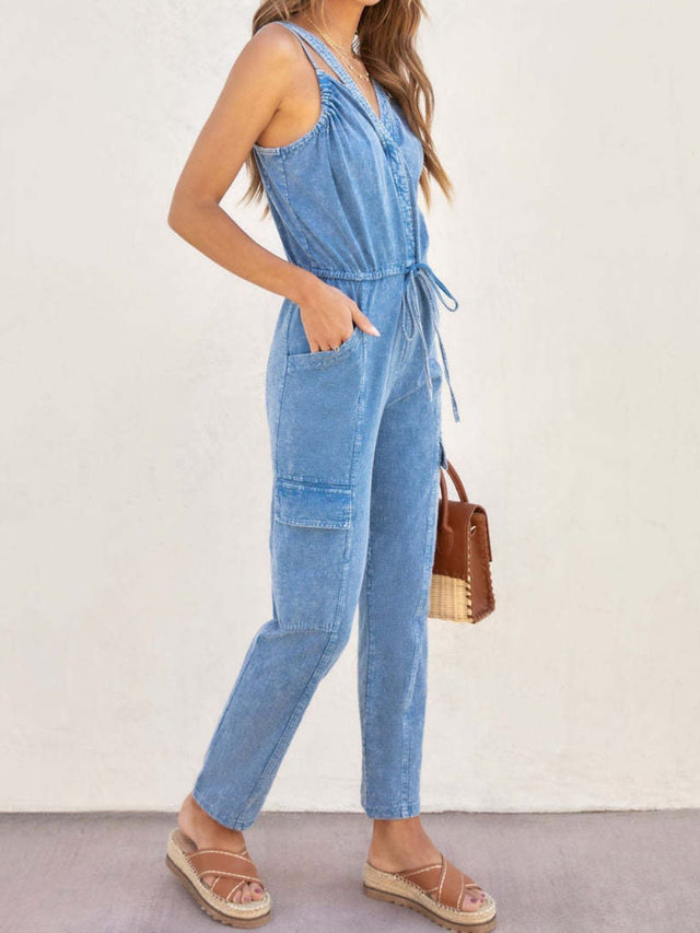 V-Neck Sleeveless Denim Jumpsuit with Pockets and Drawstring.