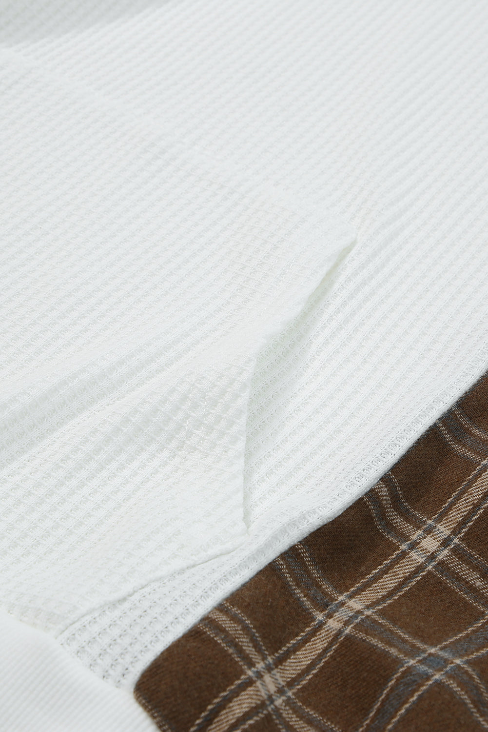 Waffle knit plaid long sleeve kangaroo pocket hoodie with drawstring.