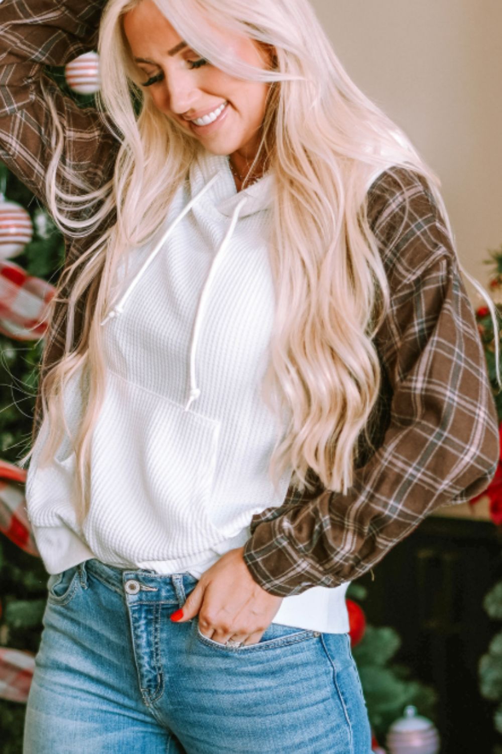 Waffle knit plaid long sleeve kangaroo pocket hoodie with drawstring.