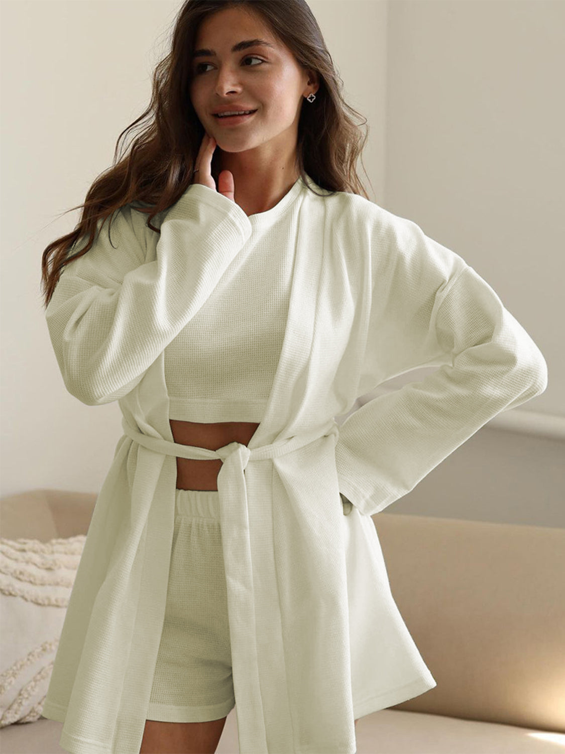 Three-piece set: waffle knit round neck T-shirt, open front cardigan, and shorts.
