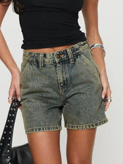 Distressed raw hem denim shorts with buttons and pockets.