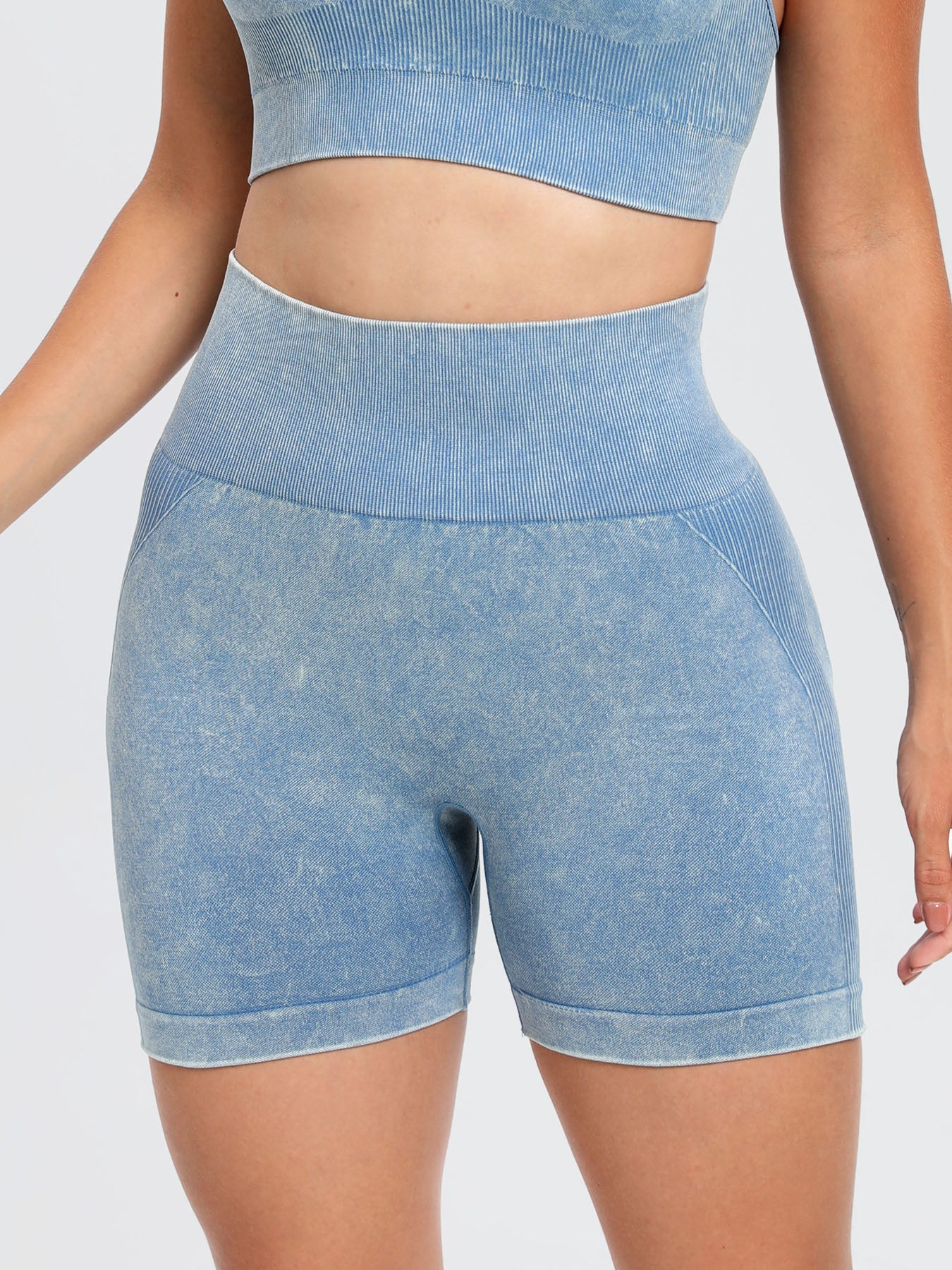 Solid drawstring smocked waist pocketed shorts.