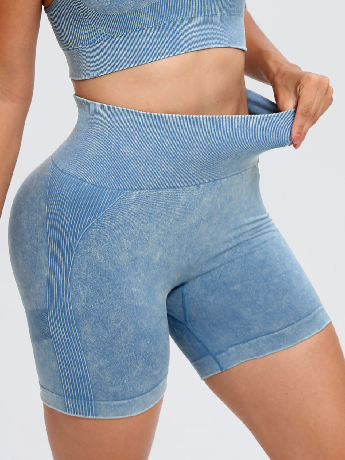 Solid drawstring smocked waist pocketed shorts.