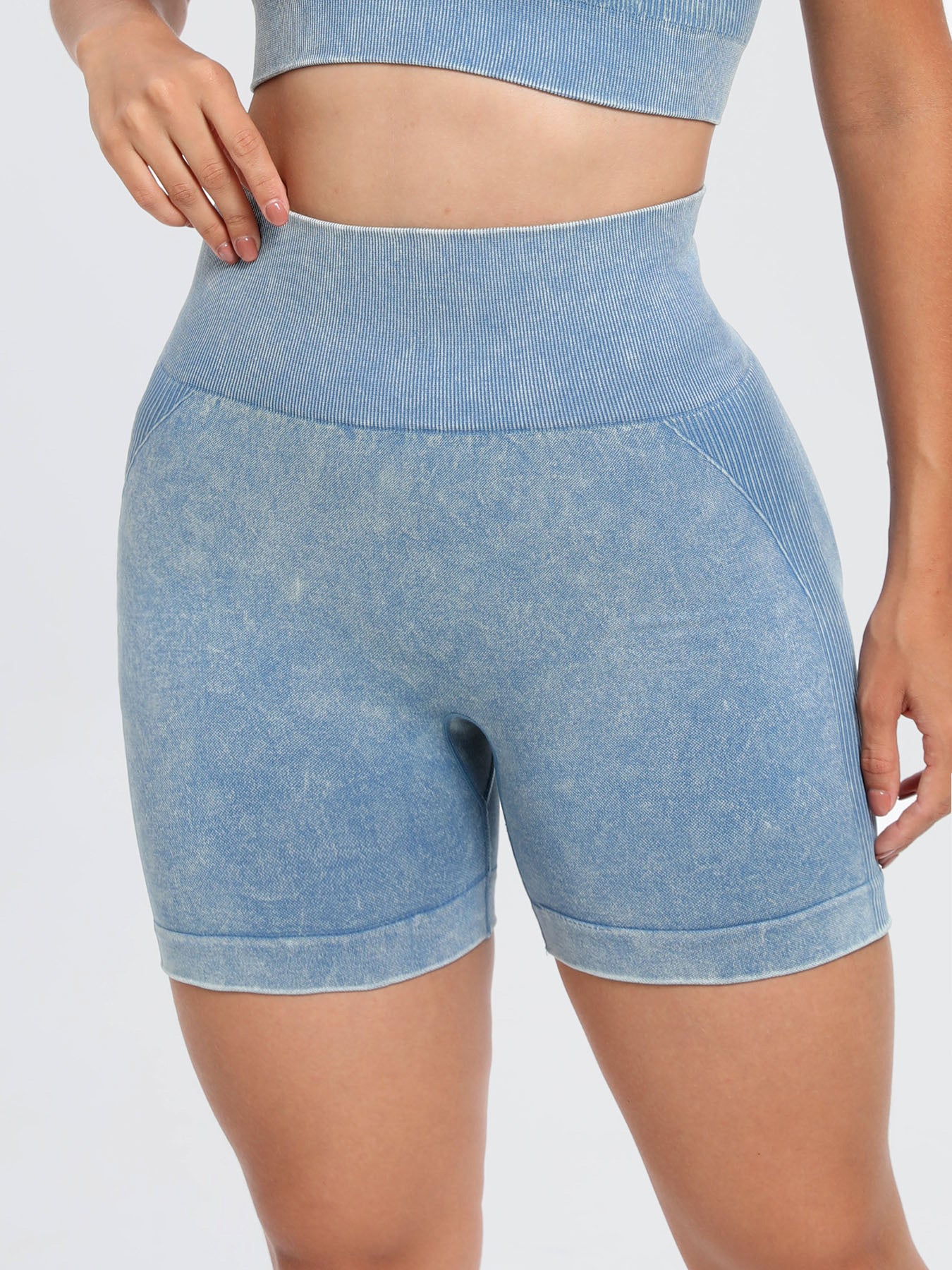 Solid drawstring smocked waist pocketed shorts.
